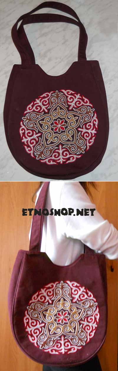 Женская сумка ручной работы из плотной ткани с искусно вышитым казахским национальным узором.